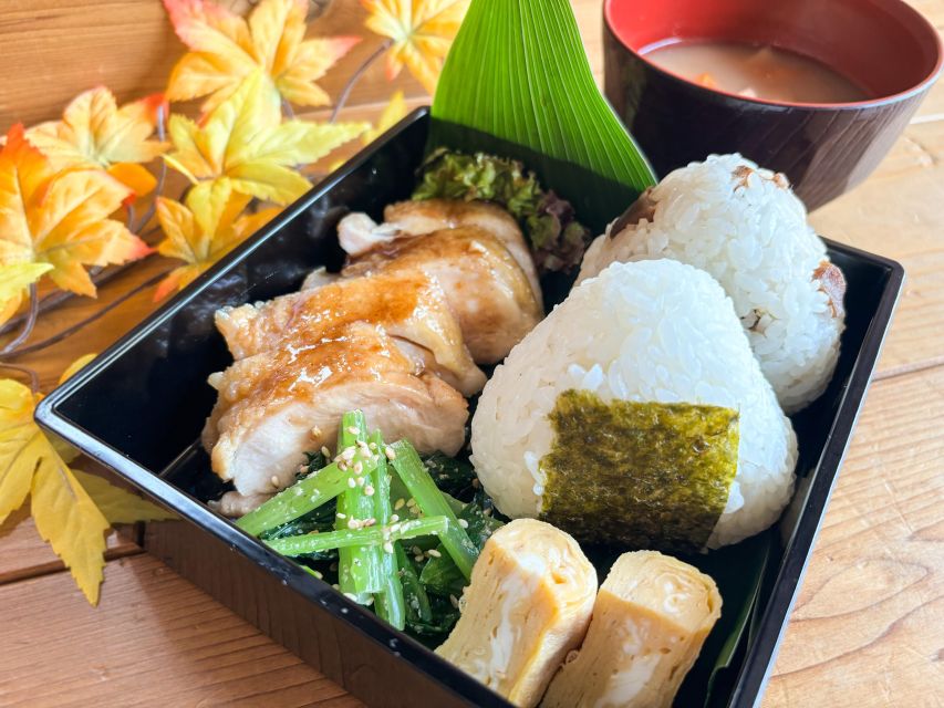 World-Famous Dish Teriyaki Chicken Bento With Onigiri - Language and Highlights